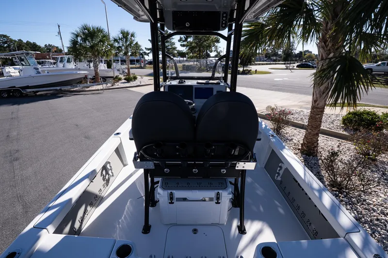 Slide: The Image of 2026 Sea Pro 230 Bay boat, white deck, outdoor display, modern design. - 7