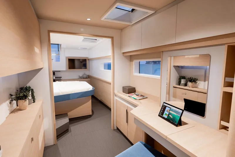 Slide: The Image of Luxurious interior of 2026 Fountaine Pajot 48 yacht with modern furnishings and natural light. - 9