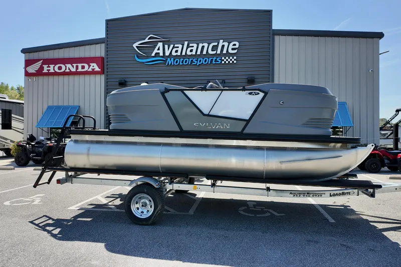 The Image of 2026 Sylvan A16 LZ pontoon boat on trailer at Avalanche Motorsports. - 0
