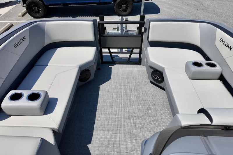 Slide: The Image of 2026 Sylvan A16 LZ boat interior with gray seating and cup holders. - 8