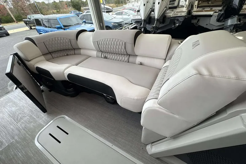 Slide: The Image of Luxurious seating on 2026 Avalon Excalibur 25' boat, featuring elegant upholstery and modern design. - 14