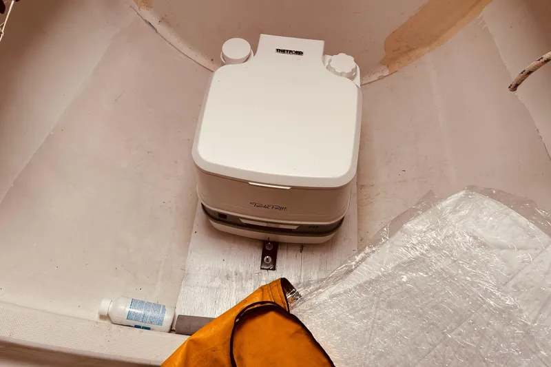 Slide: The Image of Portable toilet in a 2003 Beneteau Figaro Beneteau 2 sailboat interior. - 22