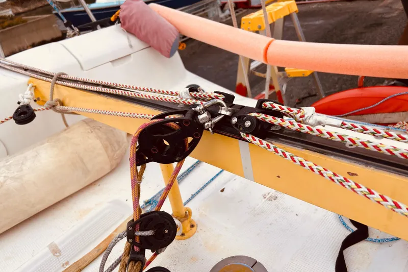 Slide: The Image of Close-up of 2003 Beneteau Figaro 2 sailboat rigging and deck details. - 23