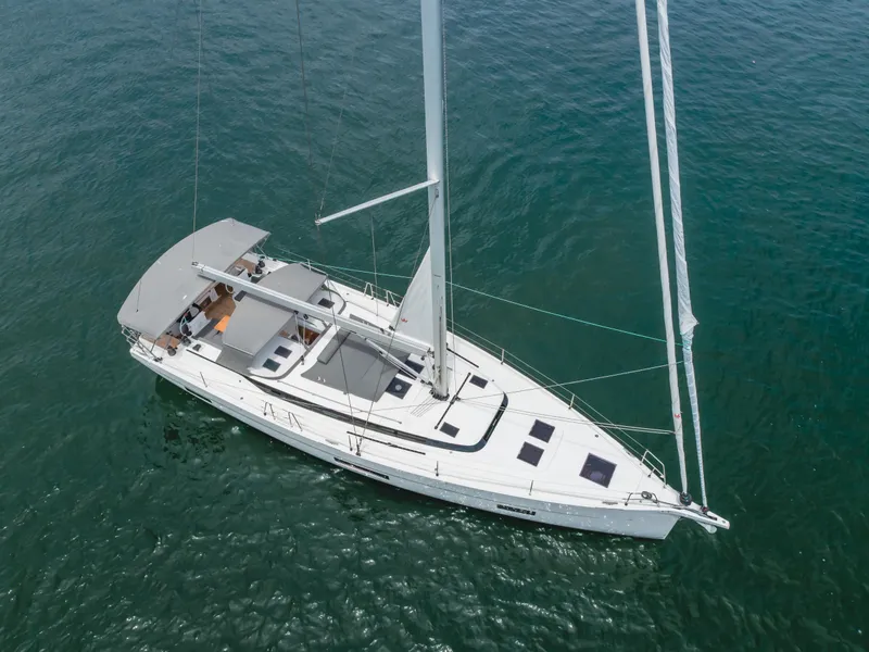 Slide: The Image of 2021 Bavaria C50 Style yacht sailing on calm blue waters. - 17