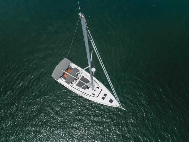Slide: The Image of Aerial view of 2021 Bavaria C50 Style sailboat on calm water. - 18