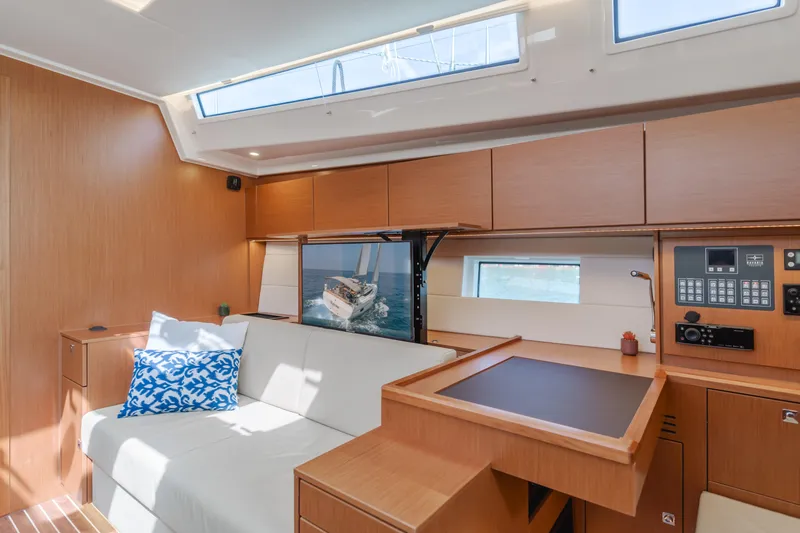 Slide: The Image of Interior of 2021 Bavaria C50 Style yacht with modern wood finish and comfortable seating. - 20