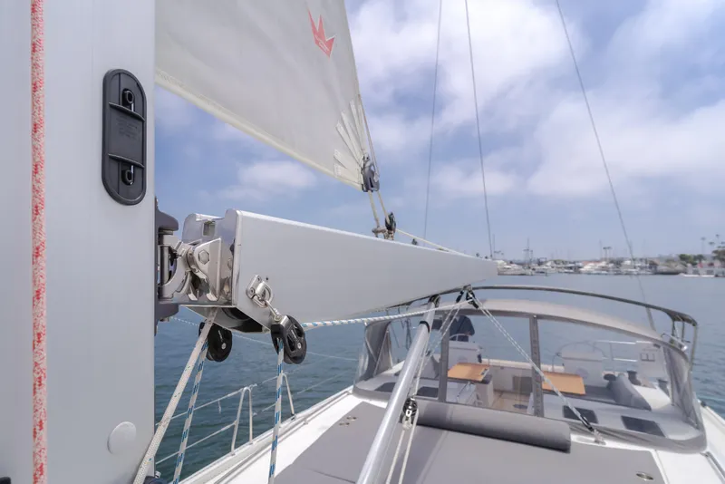 Slide: The Image of 2021 Bavaria C50 Style sailboat with raised sail, showcasing deck and rigging. - 27