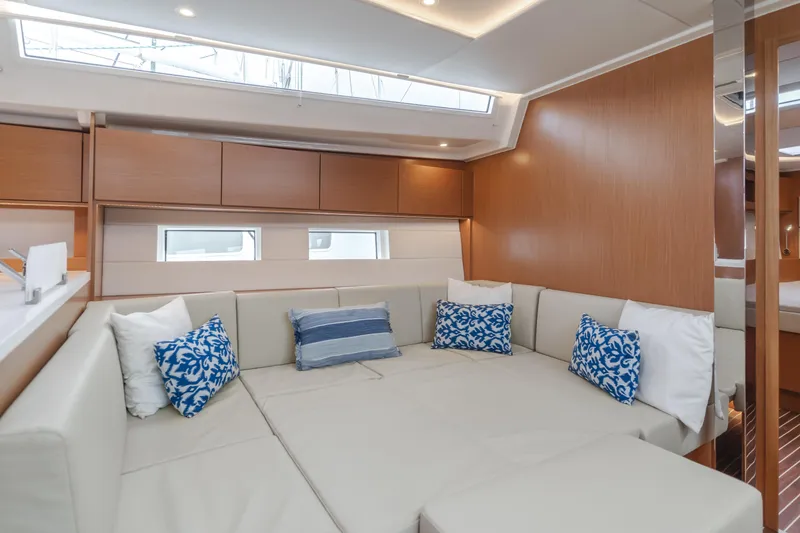 Slide: The Image of Luxurious interior of 2021 Bavaria C50 Style yacht with plush seating and decorative pillows. - 42