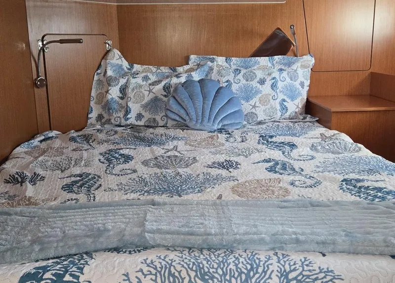 Slide: The Image of Cozy bedroom in 2021 Bavaria C50 Style yacht with ocean-themed bedding. - 46