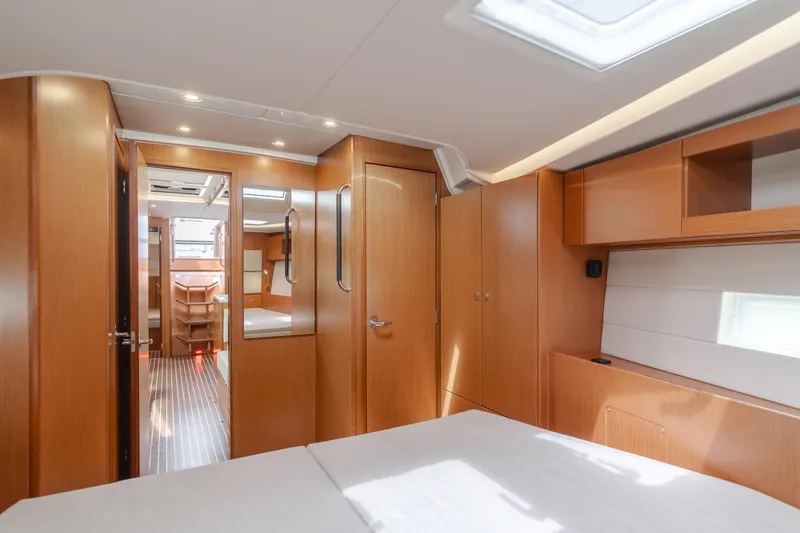 Slide: The Image of 2021 Bavaria C50 Style yacht interior with wooden cabinetry and modern design. - 47