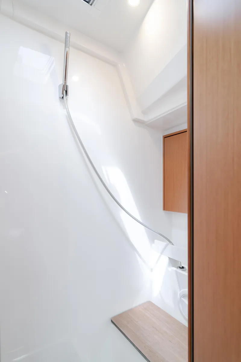 Slide: The Image of Modern bathroom interior in 2021 Bavaria C50 Style yacht, featuring sleek design and wooden accents. - 48