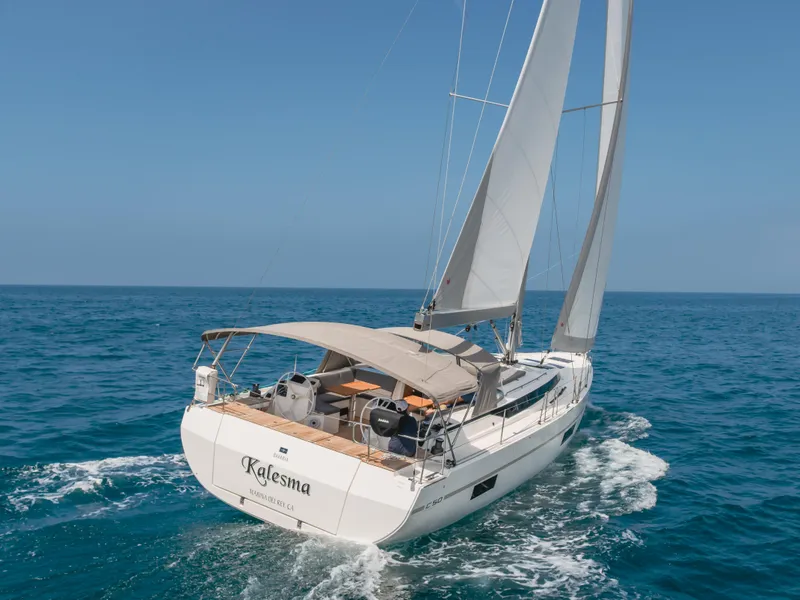 Slide: The Image of Sailing yacht Bavaria C50 Style 2021 navigating in open sea under clear blue skies. - 6
