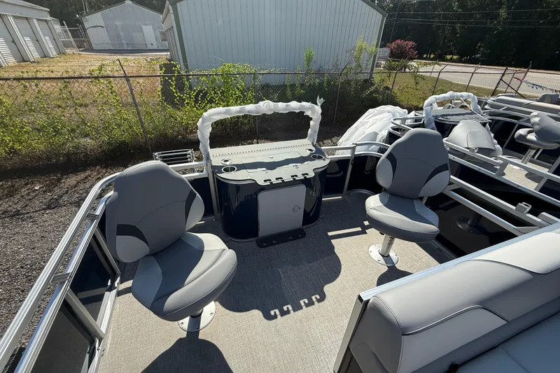 Slide: The Image of 2026 Tahoe Pontoon Sport 85 Rear Fish interior with swivel seats and fishing station. - 2