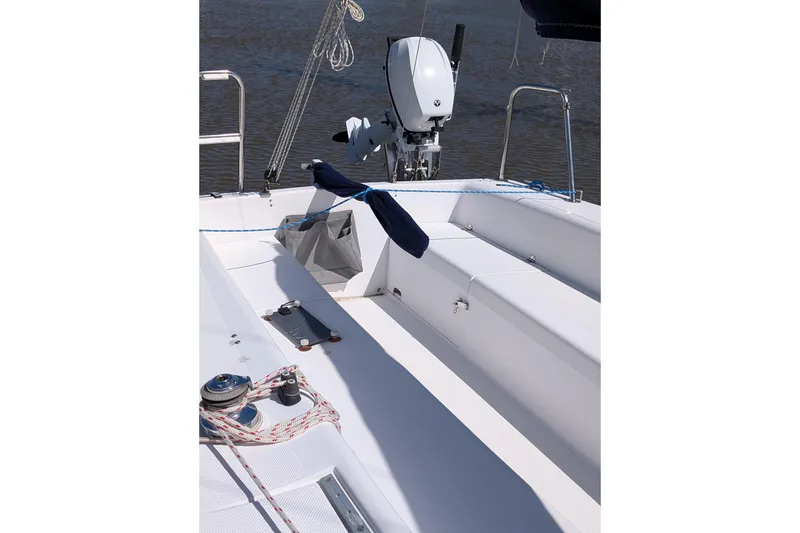 Slide: The Image of 2013 Catalina 22 Capri sailboat cockpit with motor and rigging details. - 4