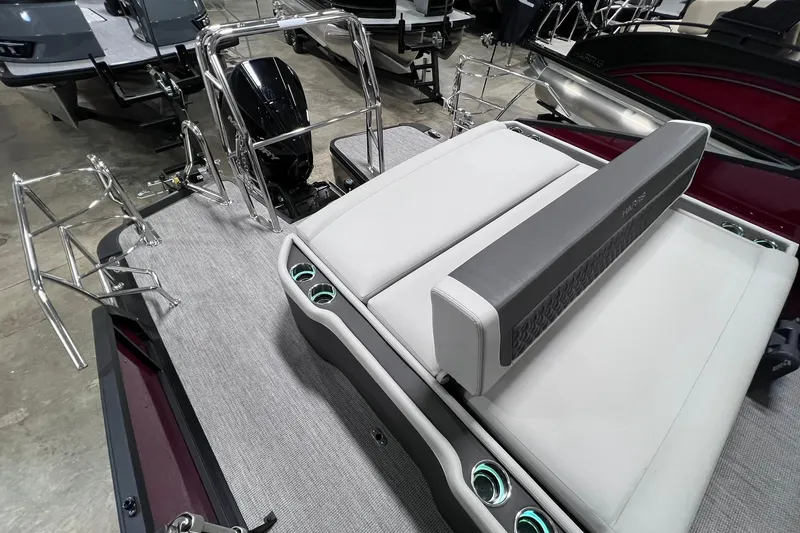Slide: The Image of 2026 Harris Sunliner 250 SLE boat interior with sleek seating and modern design. - 22