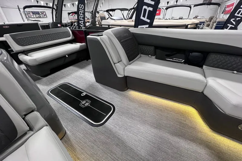 Slide: The Image of Luxurious interior of 2026 Harris Sunliner 250 SLE pontoon boat with elegant seating. - 39