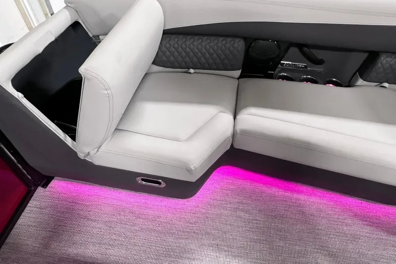 Slide: The Image of Luxurious interior of 2026 Harris Sunliner 250 SLE with ambient pink lighting. - 41