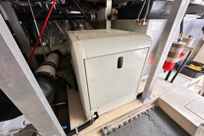 Slide: The Image of Engine room of 1998 Navigator 4800 yacht with machinery and equipment. - 9