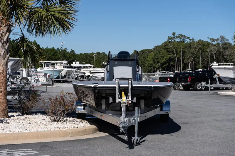 Slide: The Image of 2026 Turner Boatworks 24 SAVAGE on trailer in marina parking lot. - 16