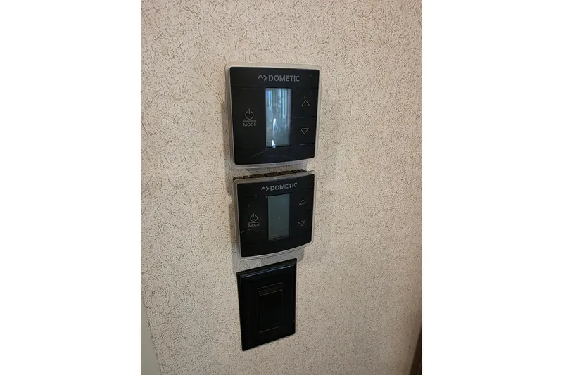 Slide: The Image of Dometic control panels in 2018 Heritage Glen 356QB RV interior. - 27