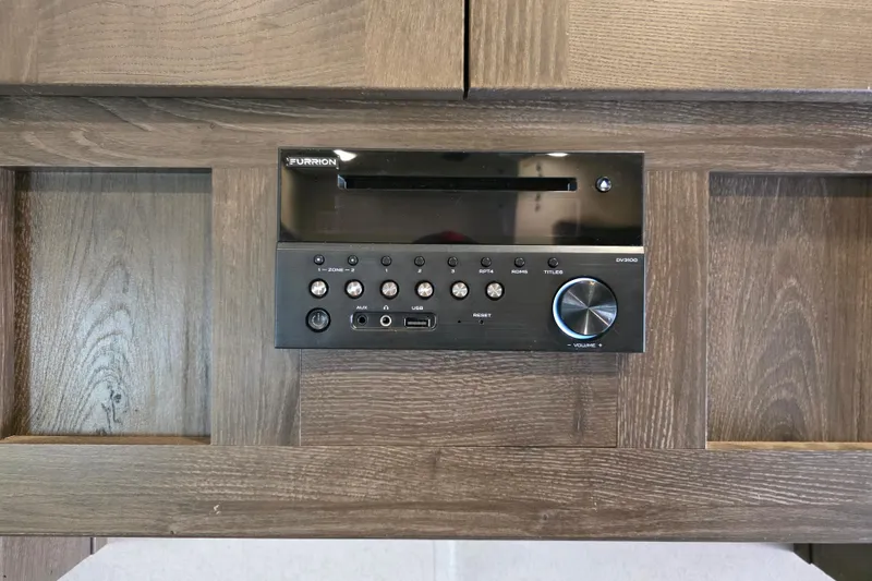 Slide: The Image of Furrion DV3300 stereo system in 2018 Heritage Glen 356QB RV interior. - 29
