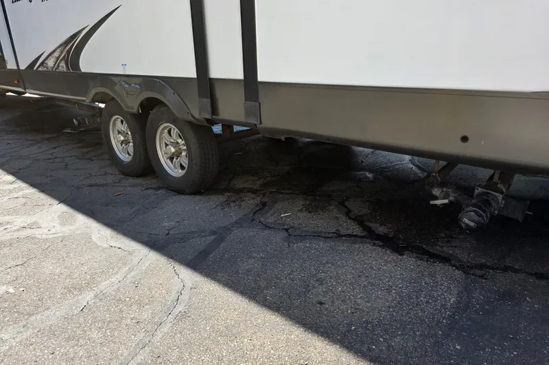 Slide: The Image of 2018 Heritage Glen 356QB RV with dual wheels parked on cracked pavement. - 31