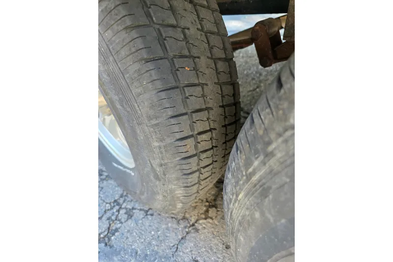 Slide: The Image of Close-up of worn tires on a 2018 Heritage Glen 356QB RV. - 33