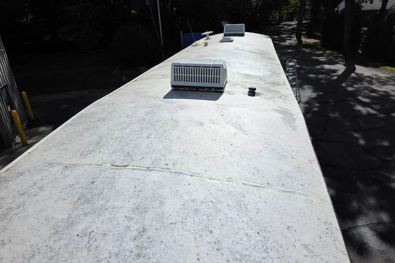 Slide: The Image of Roof of 2018 Heritage Glen 356QB RV with air conditioning units. - 7