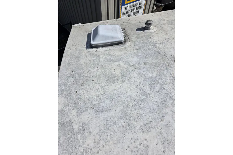 Slide: The Image of Roof of 2018 Heritage Glen 356QB RV with vent and pipe. - 8