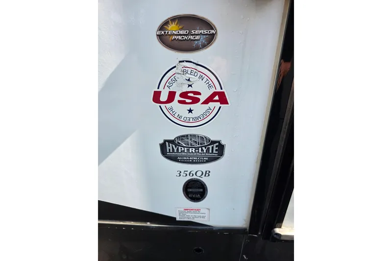 Slide: The Image of 2018 Heritage Glen 356QB RV with USA assembly and extended season package decals. - 9