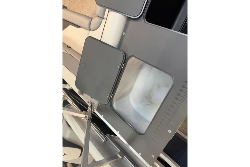 Slide: The Image of 2026 Tahoe Pontoon Sport 85 Rear Fish, featuring seating and storage compartments. - 10