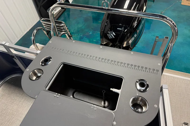 Slide: The Image of 2026 Tahoe Pontoon Sport 85 Rear Fish boat with fishing station and motor. - 11