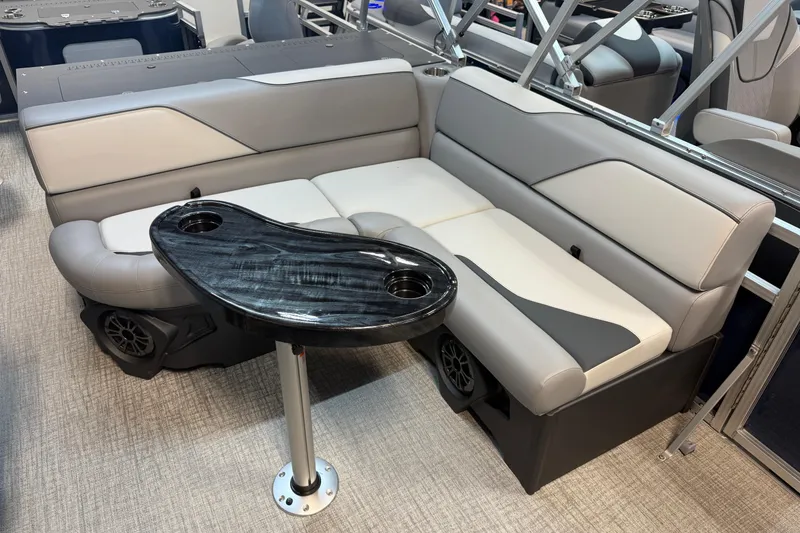 Slide: The Image of 2026 Tahoe Pontoon Sport 85 Rear Fish interior with sleek seating and modern table design. - 4