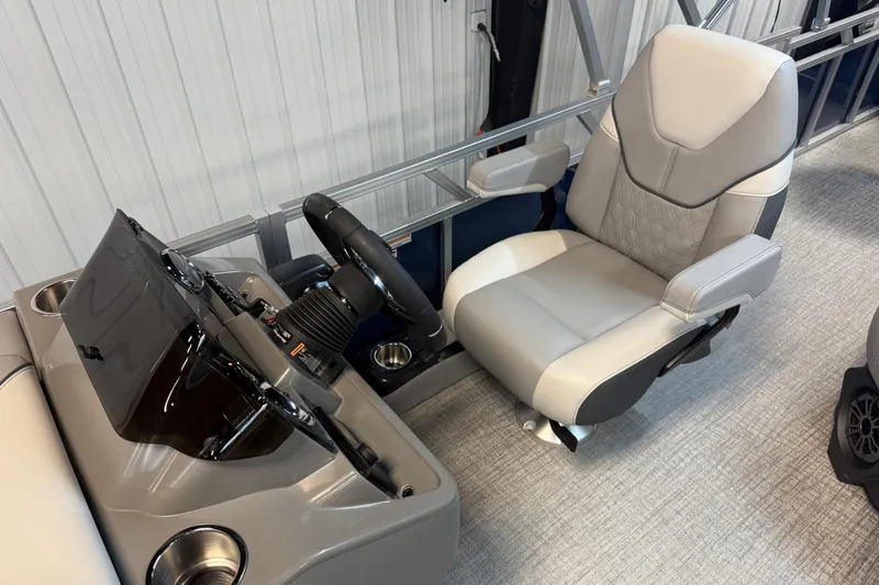 Slide: The Image of 2026 Tahoe Pontoon Sport 85 Rear Fish captain's chair and helm, featuring modern design. - 6