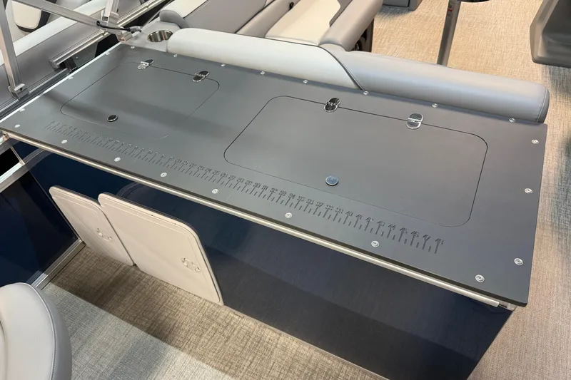 Slide: The Image of 2026 Tahoe Pontoon Sport 85 Rear Fish boat with sleek fishing station and seating. - 8