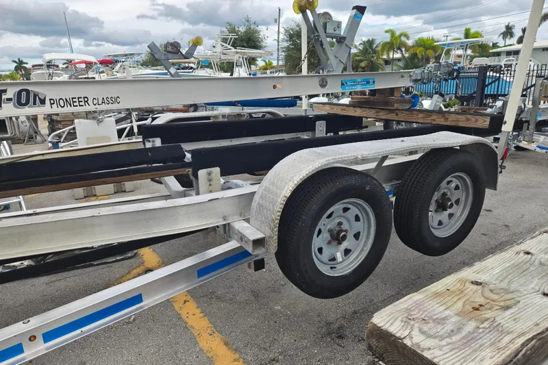 Slide: The Image of Boat trailer with dual wheels, ALL STAR 2022DA07 model, parked outdoors. - 4