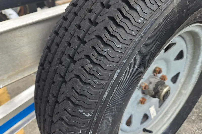 Slide: The Image of Close-up of ALL STAR 2022DA07 tire on metal wheel, 2015 model. - 6