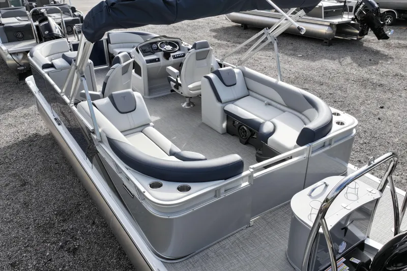 Slide: The Image of 2026 Tahoe Pontoon LTZ Quad Lounger with luxurious seating and modern design. - 4