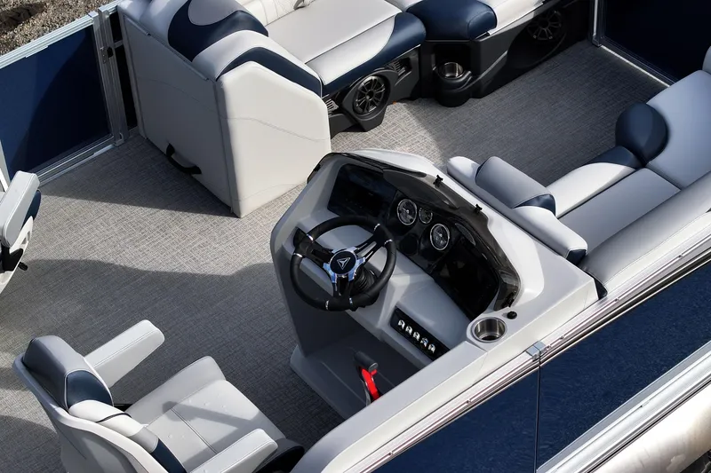 Slide: The Image of 2026 Tahoe Pontoon LTZ Quad Lounger interior with modern seating and steering console. - 5
