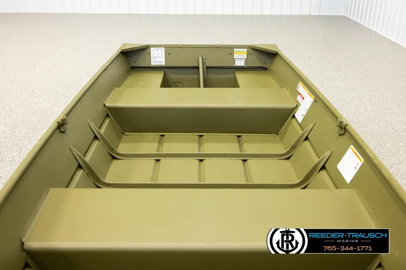 Slide: The Image of 2025 Lund 1240 boat interior with bench seats and storage compartments. - 15