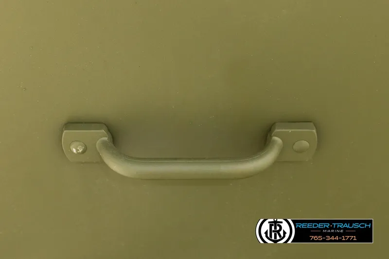 Slide: The Image of Handle on Lund 1240 boat, 2025 model, with Reeder-Trausch Marine logo. - 18