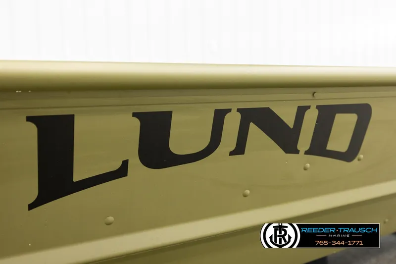 Slide: The Image of 2025 Lund 1240 boat side view with logo and Reeder-Trausch Marine branding. - 19