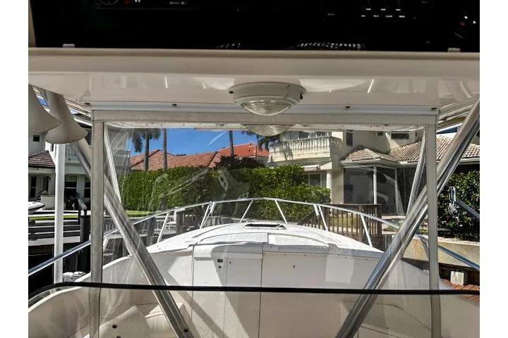 Slide: The Image of Control panel of a 1998 Intrepid 356 Cuddy boat with Suzuki displays. - 15