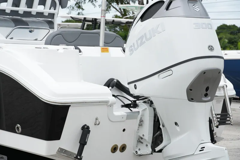 Slide: The Image of 2025 NauticStar 242 Offshore boat with Suzuki 300 outboard motor. - 7