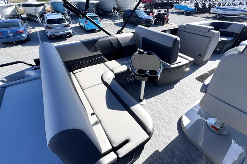 Slide: The Image of Luxurious seating area on 2026 Sylvan L3 CLZ pontoon boat, featuring modern design and comfort. - 14