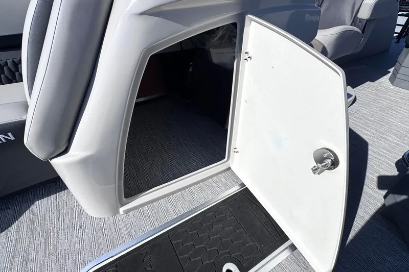 Slide: The Image of Open storage compartment on 2026 Sylvan L3 CLZ boat, featuring sleek interior design. - 19