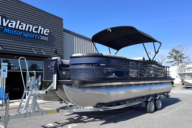 Slide: The Image of 2026 Sylvan L3 CLZ pontoon boat on trailer at Avalanche Motorsports. - 4