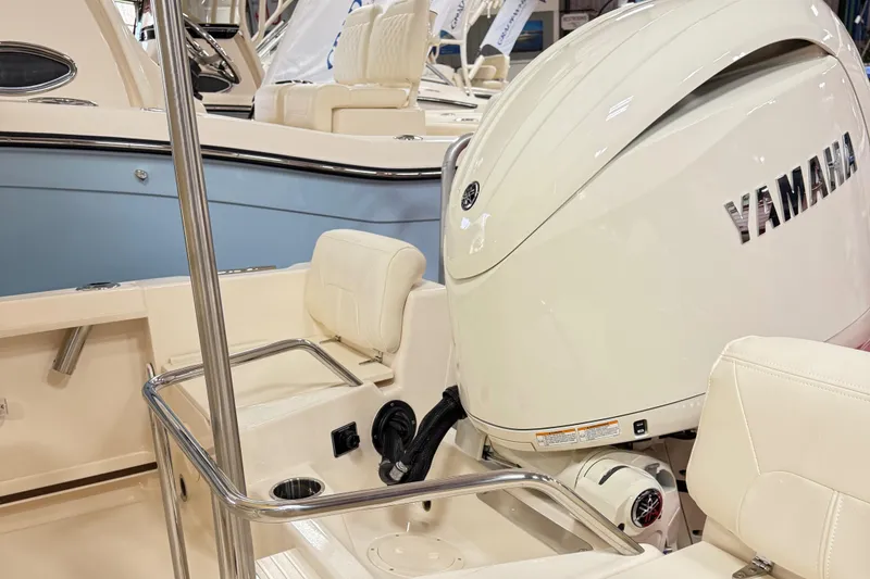 Slide: The Image of 2025 Grady-White Fisherman 180 boat interior with steering console and seating. - 3