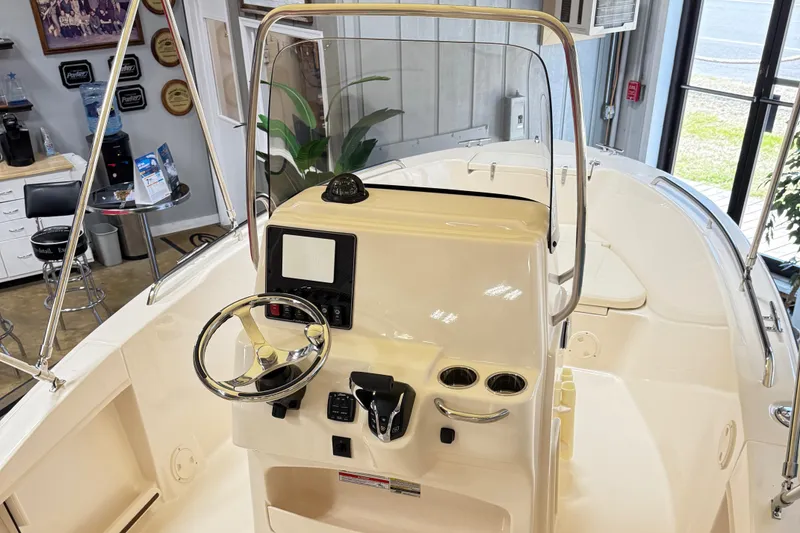 Slide: The Image of 2025 Grady-White Fisherman 180 boat console with Garmin navigation system. - 4