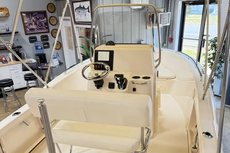 Slide: The Image of 2025 Grady-White Fisherman 180 boat interior with Tri-State Marine branding. - 5